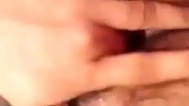 Indian girl nude MMS of a girl fingering her hairy pussy